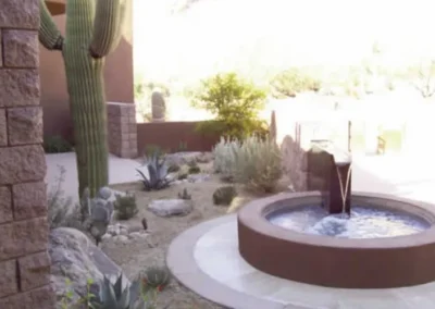Contemporary Stone Basin Fountain In Desert Courtyard