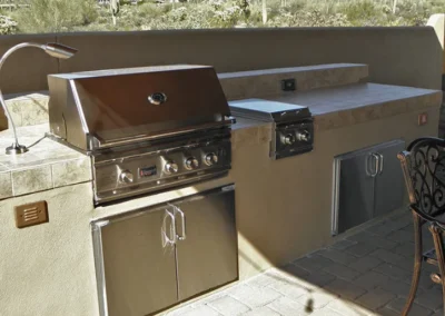 Outdoor kitchen and grill setup in Tucson backyard