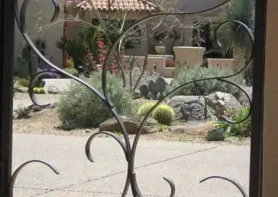 Decorative Iron Gate With Tucson Xeriscape In Foreground