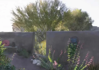 Desert Adobe Home Entrance Gate With Stucco Wall Landscaping