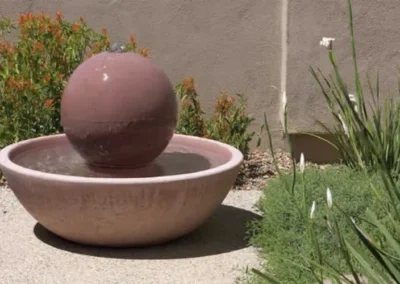 Sphere Water Fountain In Desert Courtyard Landscape