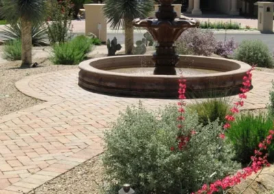 Stone Courtyard Landscape With Central Fountain In Tucson