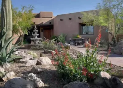 Tucson Landscape Design With Boulders And Rustic Plantings