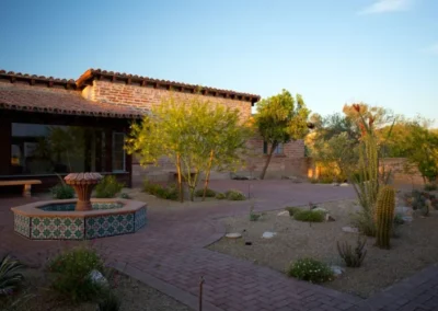 Xeriscape Front Yard With Curved Desert Planting Beds