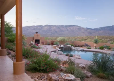 Southwestern patio with a swimming pool and desert mountain landscape view