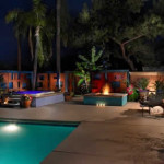 Colored concrete patio and pool deck with raised spa and fire feature | 2009 APLD Merit Award