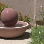 Wok fountain with concrete sphere