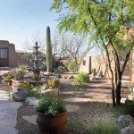 Mexican fountain flagstone path and low maintenance plantings